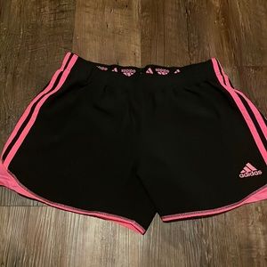 These are Adidas dry fit shorts. They are size women’s medium.